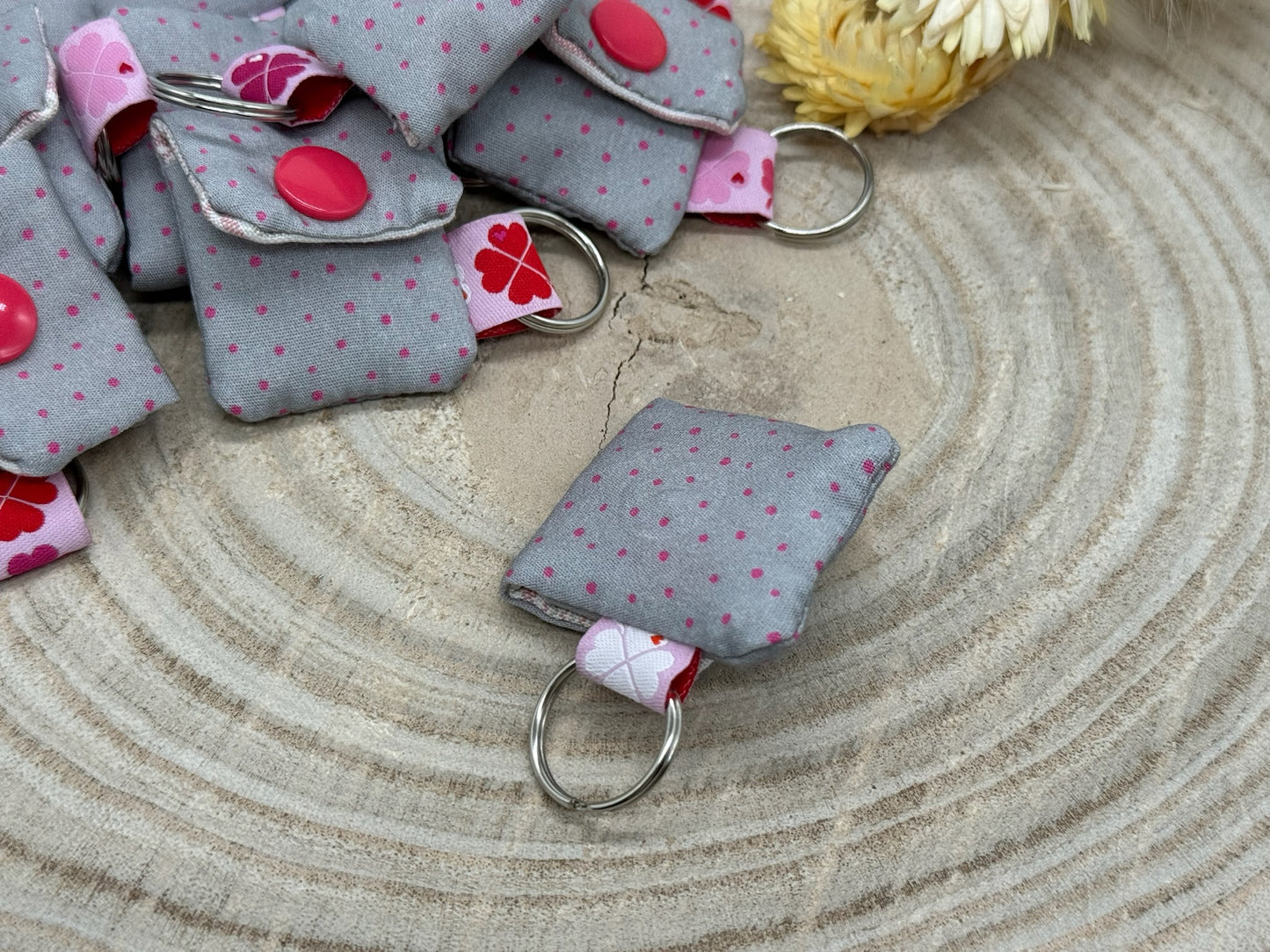 Schlüsselanhänger Mini Tasche mit Einkaufswagenchip praktische Mini Geldbörse Pünkchen rosa/grau