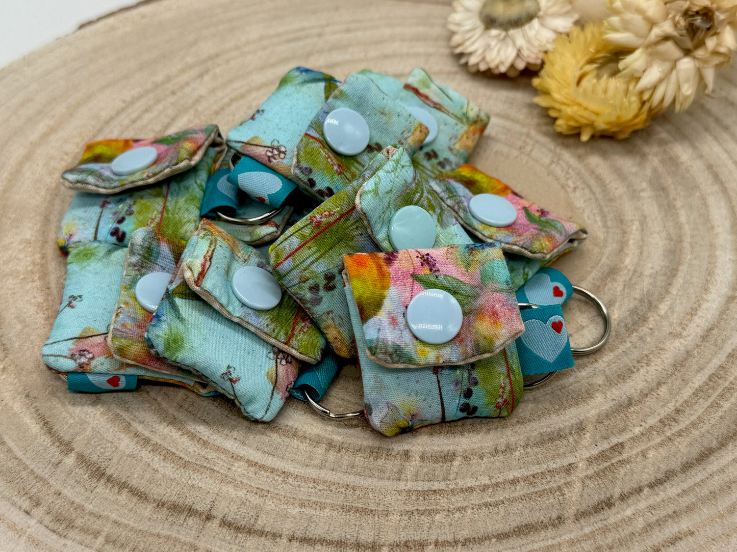 Schlüsselanhänger Mini Tasche mit Einkaufswagenchip praktische Mini Geldbörse bunte Blumen auf blau
