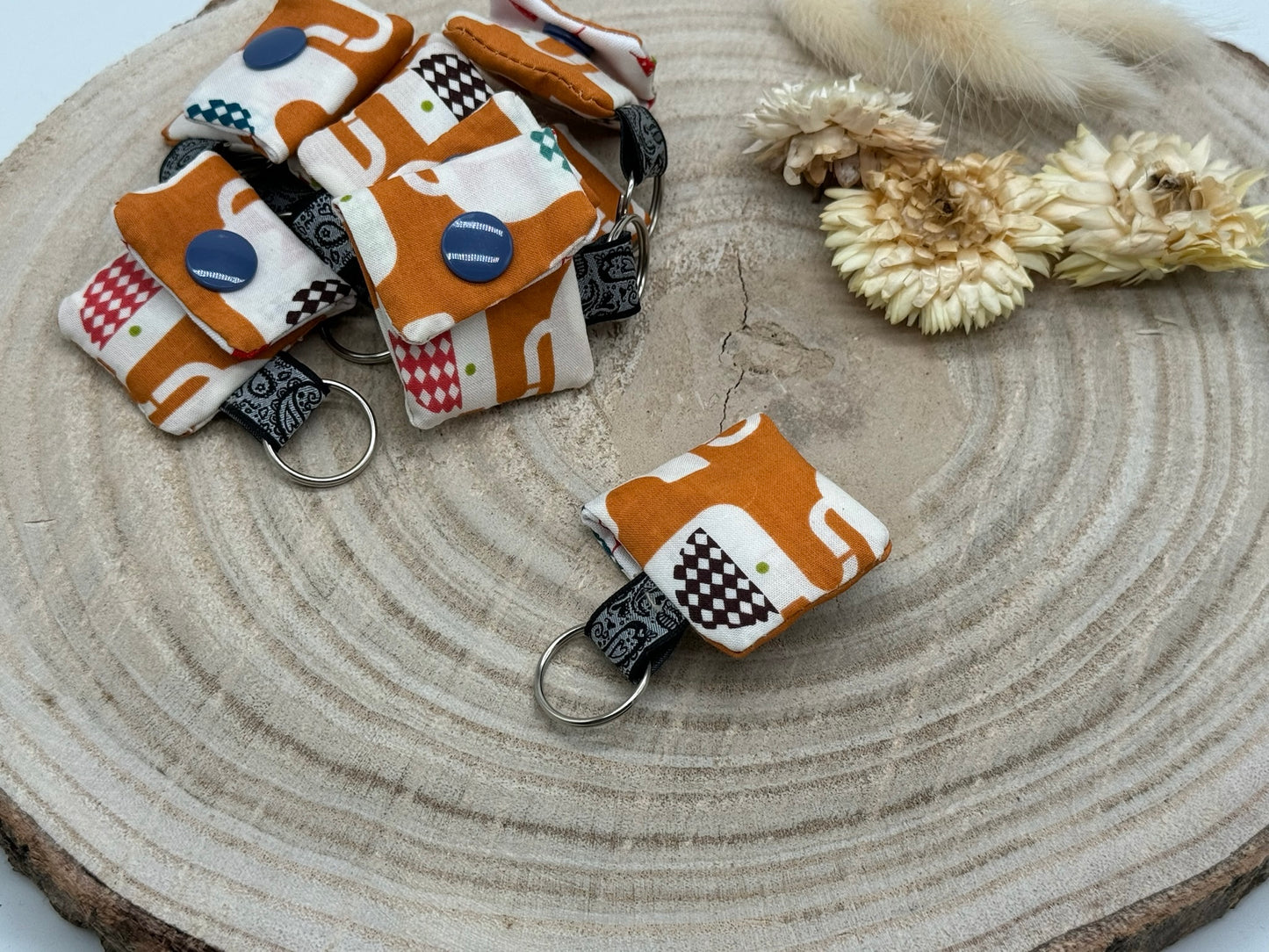Schlüsselanhänger Mini Tasche mit Einkaufswagenchip praktische Mini Geldbörse Elefant auf braun