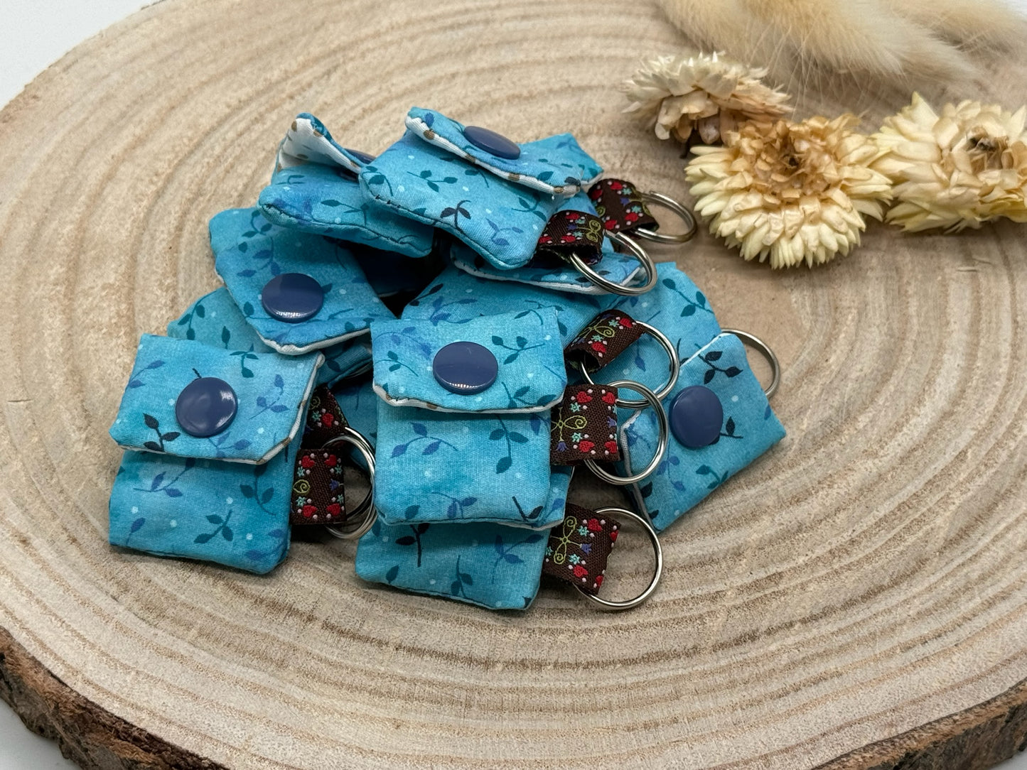 Schlüsselanhänger Mini Tasche mit Einkaufswagenchip praktische Mini Geldbörse blau mit Blätter