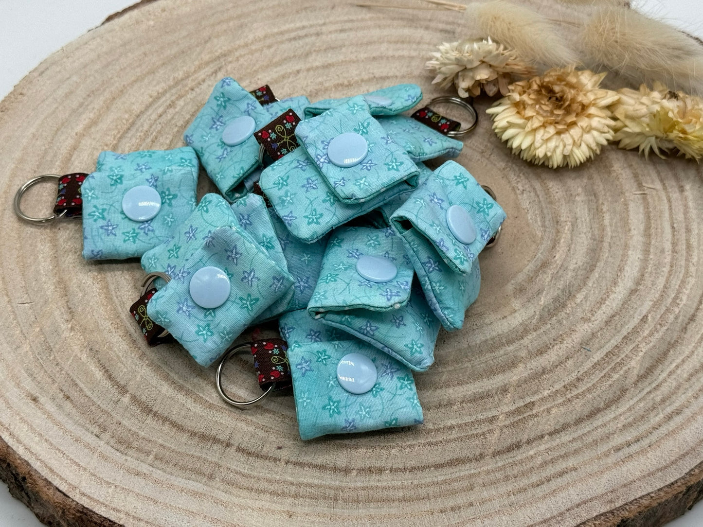 Schlüsselanhänger Mini Tasche mit Einkaufswagenchip praktische Mini Geldbörse hellblau mit Blätter