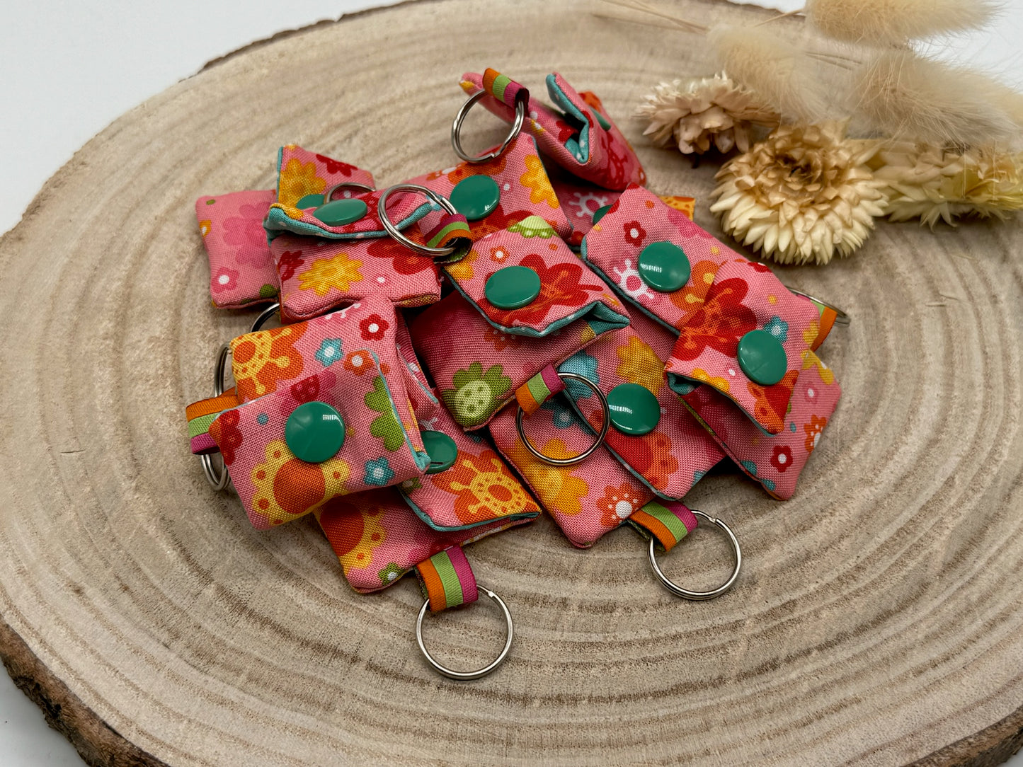 Schlüsselanhänger Mini Tasche mit Einkaufswagenchip praktische Mini Geldbörse rosa mit bunten Blumen