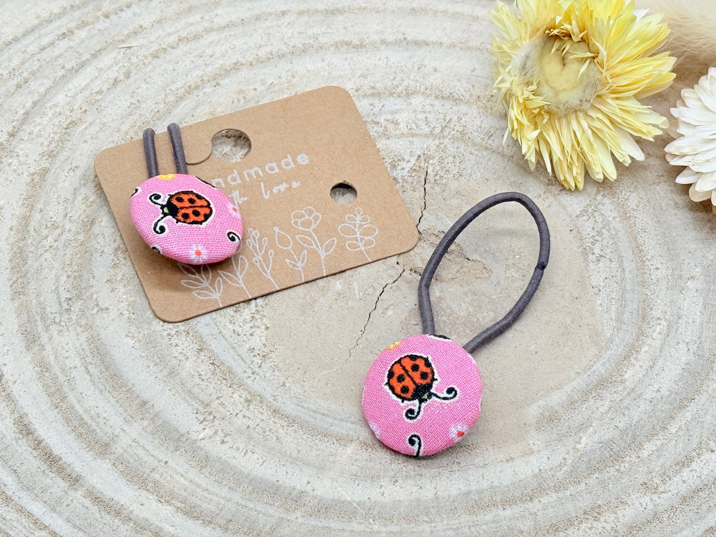 Retro Knopf Haargummi Maikäfer rosa