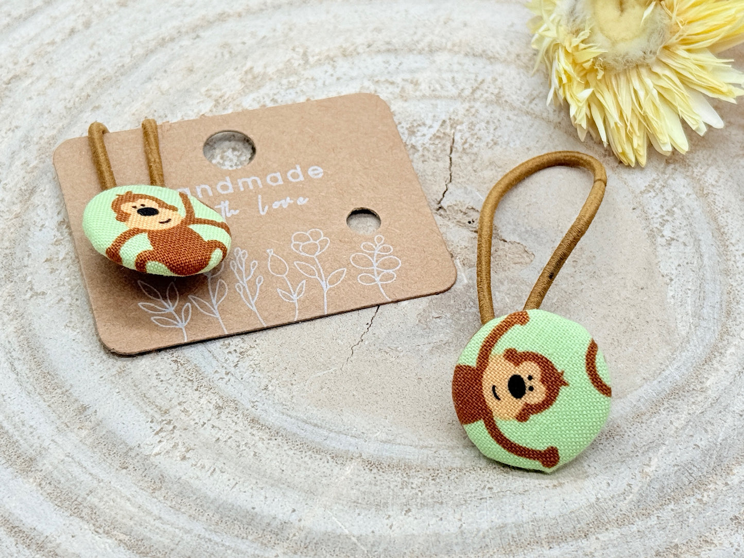 Retro Knopf Haargummi Affe grün