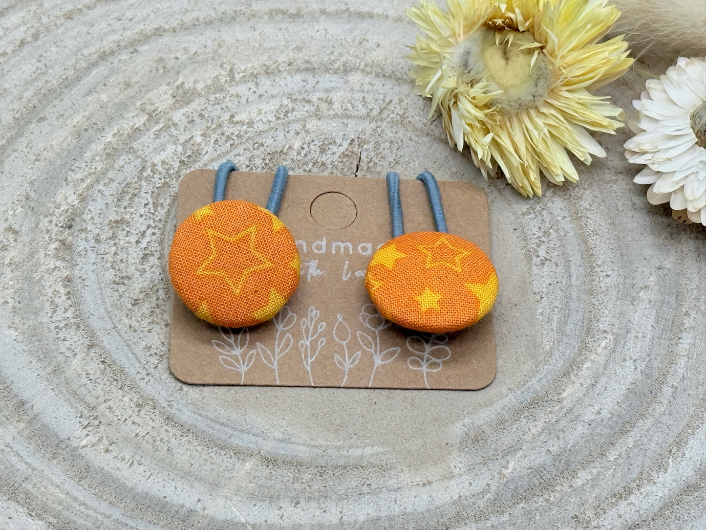 Retro Knopf Haargummi Sterne orange