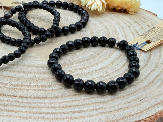 Elastisches Edelstein Armband mit Onyx Perlen