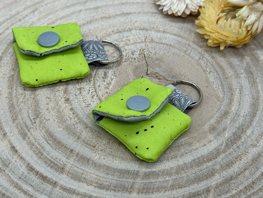 Einkaufschip Tasche Einkaufswagenchip Schlüsselanhänger praktische Mini Geldbörse Einkaufshilfe grün mit schwarzen Punkten