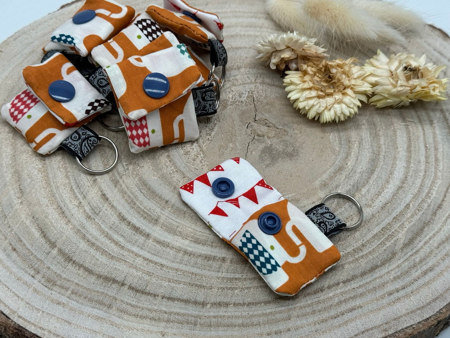 Schlüsselanhänger Mini Tasche mit Einkaufswagenchip praktische Mini Geldbörse Elefant auf braun