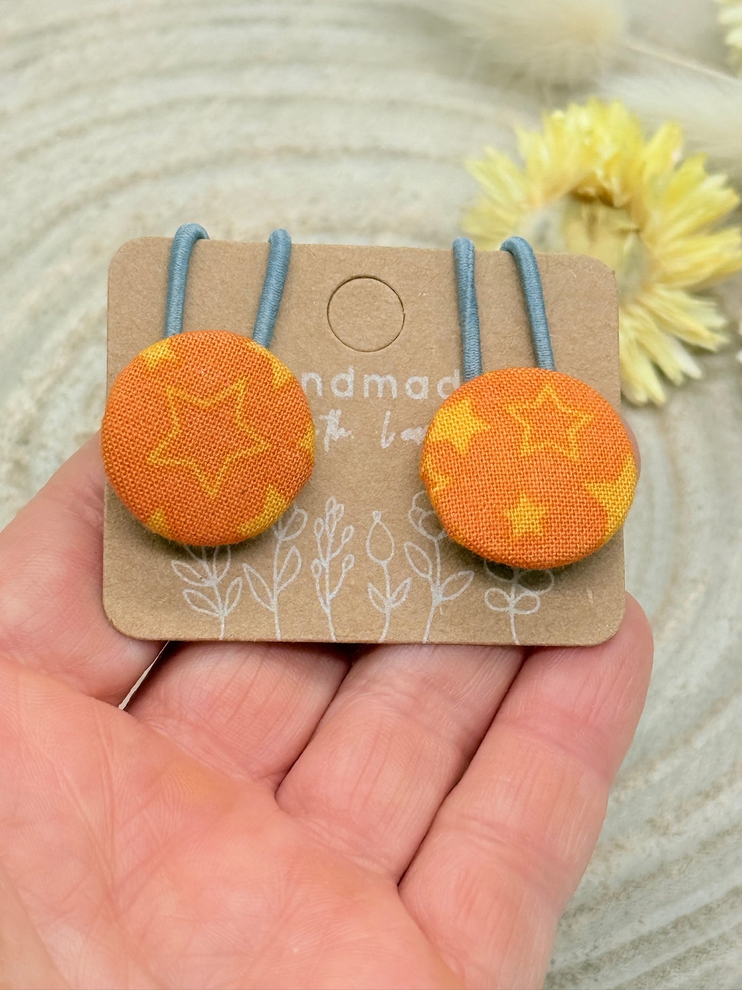 Retro Knopf Haargummi Sterne orange