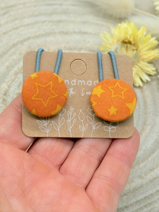 Retro Knopf Haargummi Sterne orange