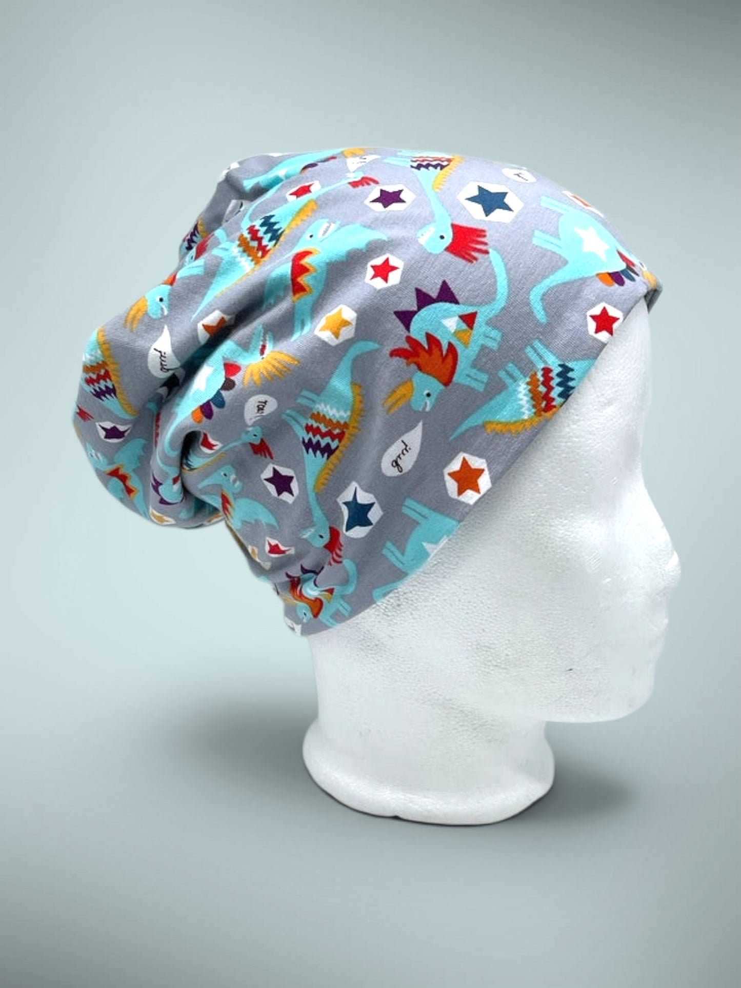 Wende-Beanie für Kinder – Dino Design grau