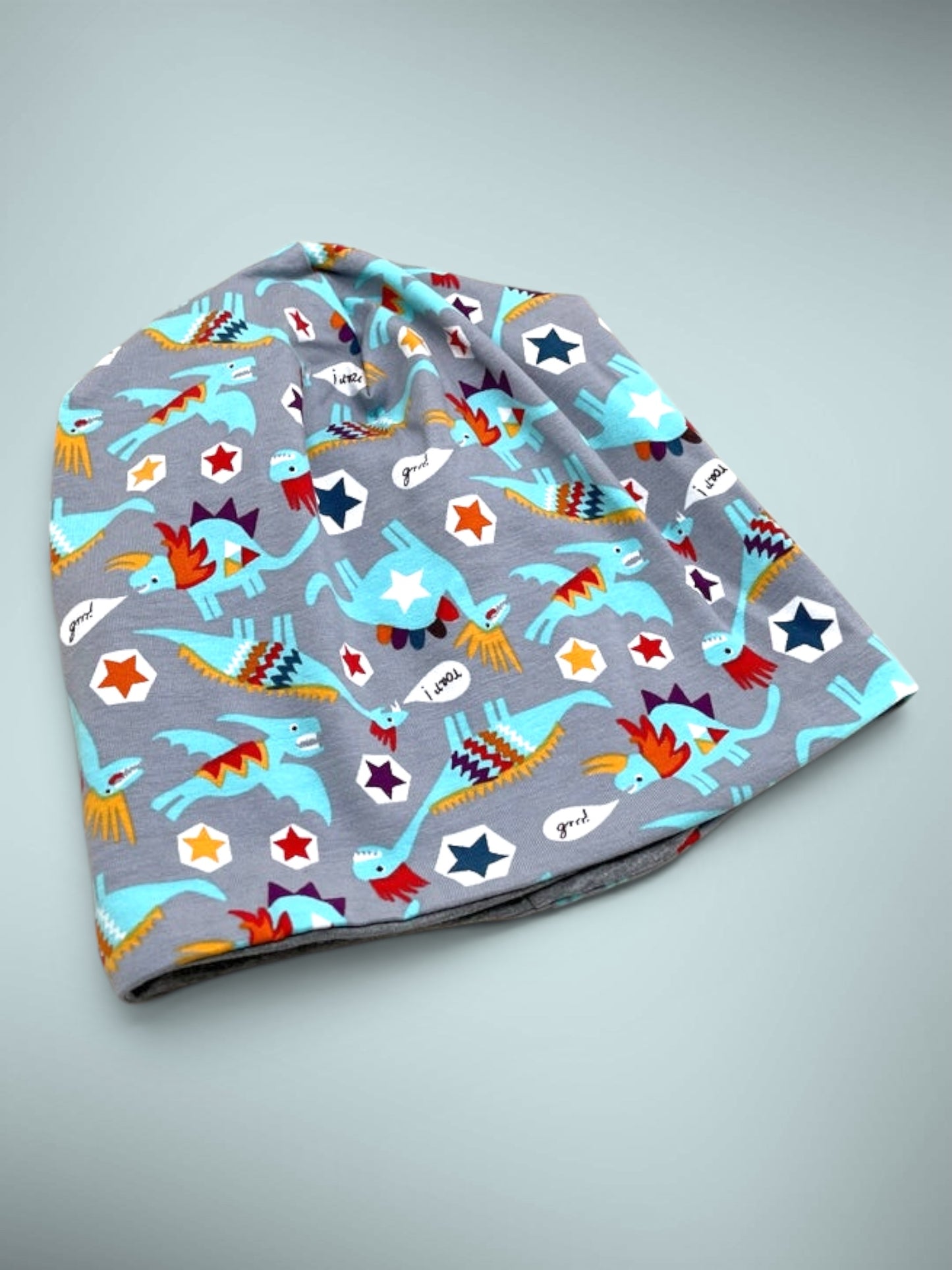 Wende-Beanie für Kinder – Dino Design grau
